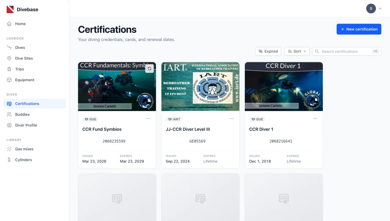 Divebase certifications page, with credential cards showing each agency, number and renewal date