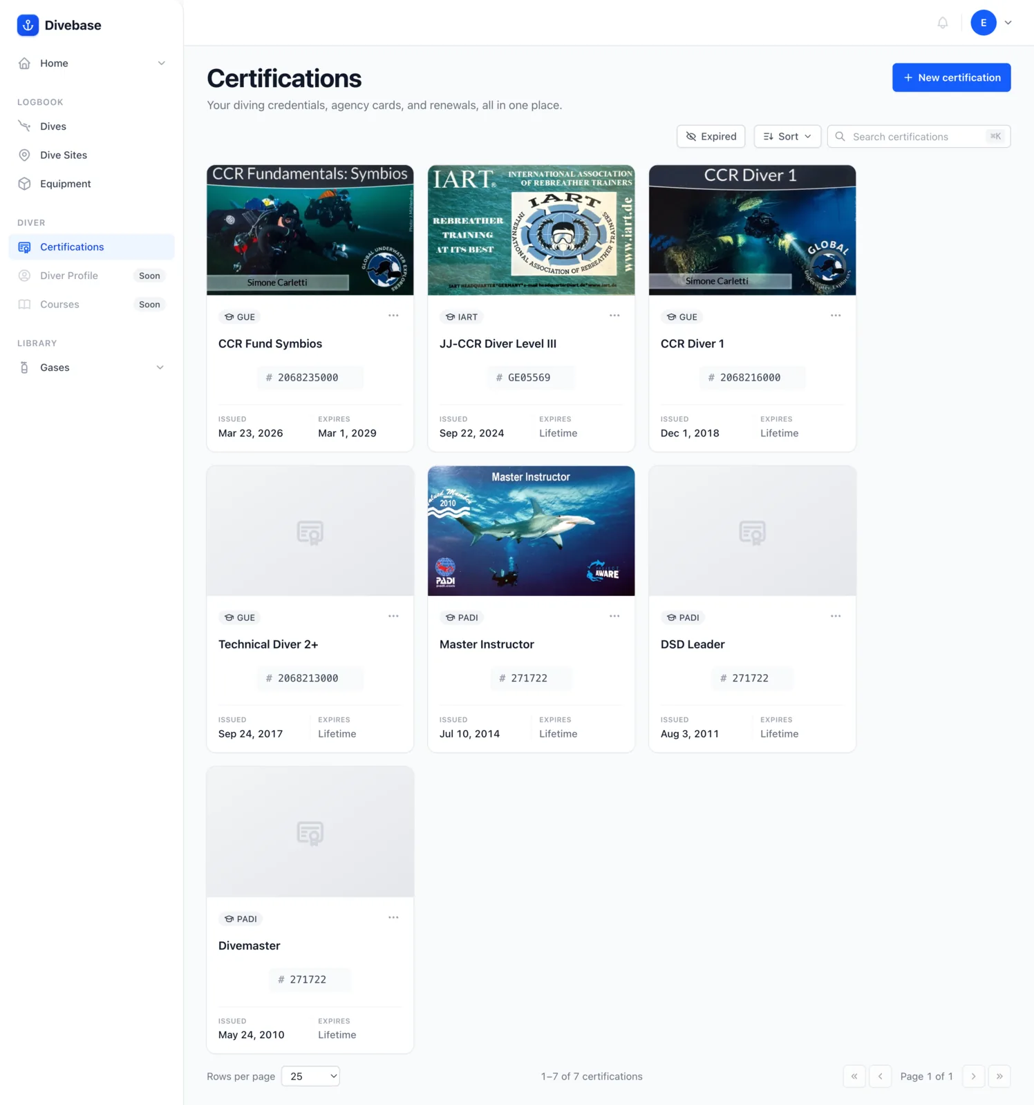 The Divebase certifications page, each credential a card with its agency, number, and dates