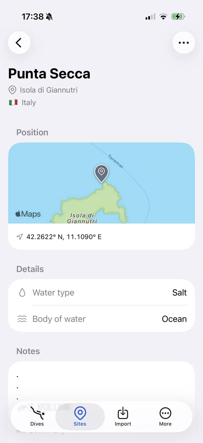 The Punta Secca dive site on the Divebase iPhone app, with its position on the map at Isola di Giannutri and its coordinates